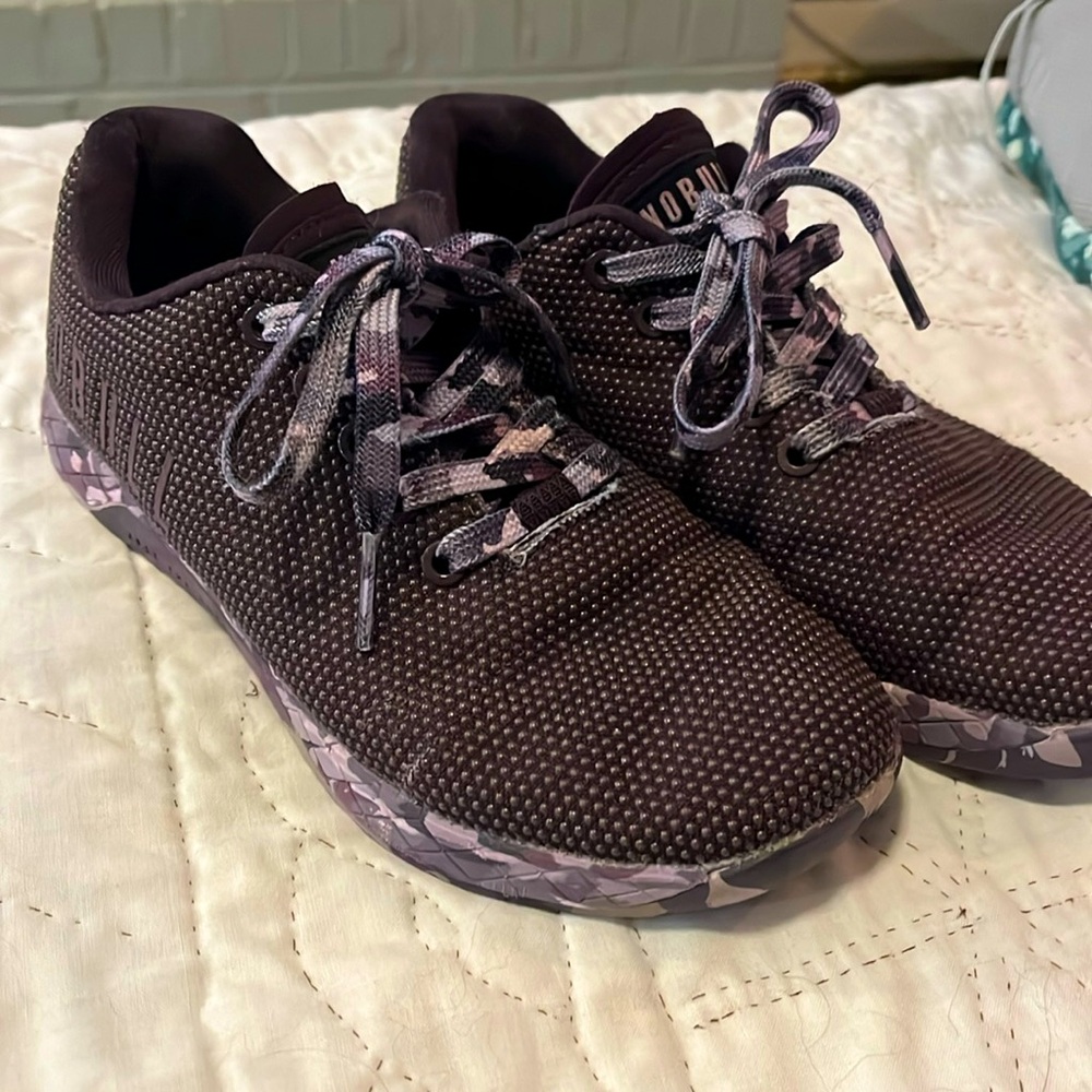 7.5 women’s NO BULLs.  Plenty of workouts left in them!